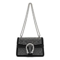 Crystal-Embellished Suede Shoulder Bag with Horseshoe Buckle